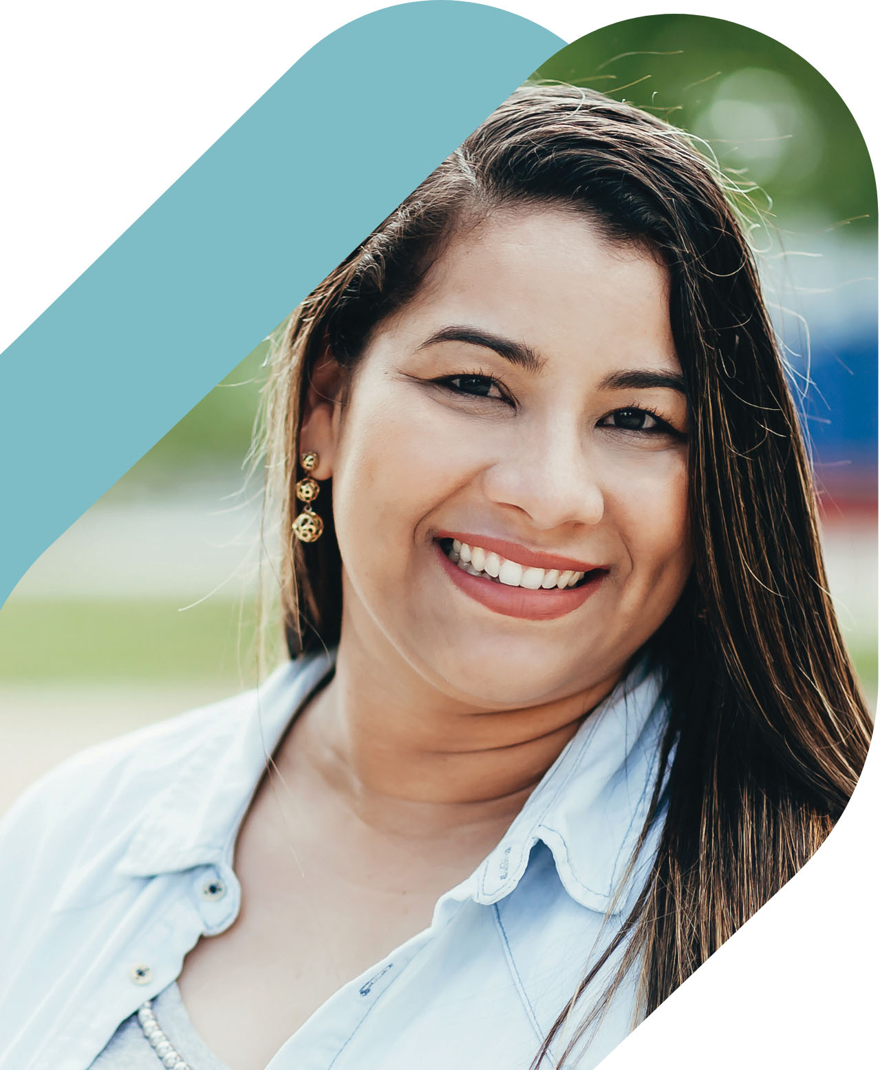 Young smiling woman with dark curly hair