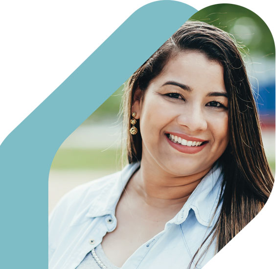 Young smiling woman with dark curly hair